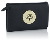 An elegant compact wallet featuring the signature Daria cutout...