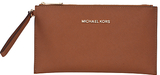 A divine purse with a bold signature Michael Kors logo plate a...