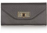 In classic black leather, Chloé’s Sally continental wallet...