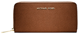 A divine purse with a bold signature Michael Kors logo plate a...