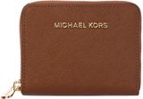 Michael Kors Jet Set Travel tan medium zip around purse , Zip...