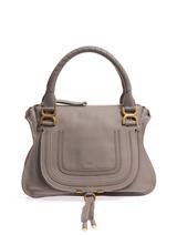 ChloÉ This light-grey leather bag is the latest incarnation of Chloé's signature Marcie tote. It boasts the same distinct rounded body and braided front flap that's defined the style for seasons and ample enough to sport every day.