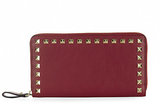 The Rockstud Zip-Around Wallet is handcrafted in Italy using t...