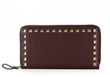 The Rockstud Zip-Around Wallet is handcrafted in Italy using t...
