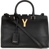 Softly structured in supple leather and reworked with a cross...