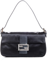 Fendi Fendi take their iconic Baguette after-hours with this satin-covered version. Crafted with all the mastery you can expect from the Italian powerhouse; its Swarovski-embellished logo-clasp glitters wonderfully against LBD’s.