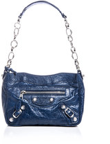 Balenciaga Balenciaga’s Giant shoulder bag is a covetable investment for Summer. Perfect for sophisticated nights out with its striking navy-blue and trademark silver hardware this It-bag makes a true style statement.